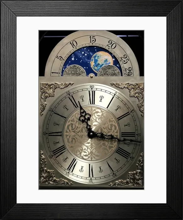 Framed Print : Close up of the clock face of a grandfather clock including a moon dial showing the phases of the moon Framed Print : Close up of the clock face of a grandfather clock including a moon dial showing the phases of the moon