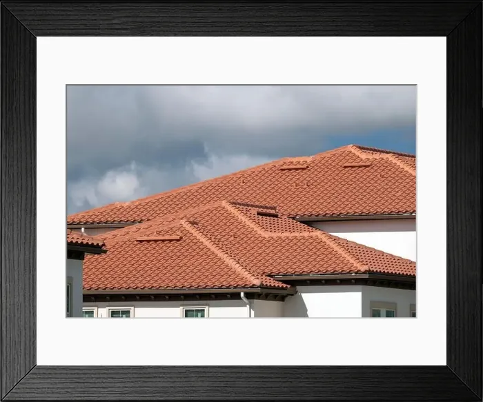 Framed Print : House rooftop covered with yellow ceramic shingles. Tiled covering of residential apartment building Framed Print : House rooftop covered with yellow ceramic shingles. Tiled covering of residential apartment building