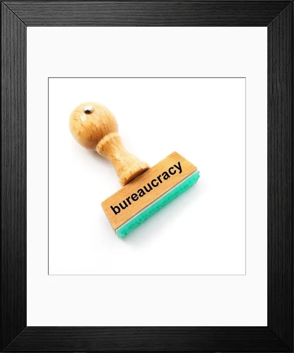 Framed Print : bureaucracy concept with stamp in office and copyspace Framed Print : bureaucracy concept with stamp in office and copyspace