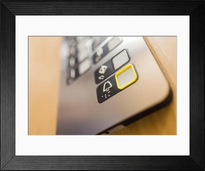 Framed Print : Close up of elevator alarm button on control panel. Emergency concept Framed Print : Close up of elevator alarm button on control panel. Emergency concept