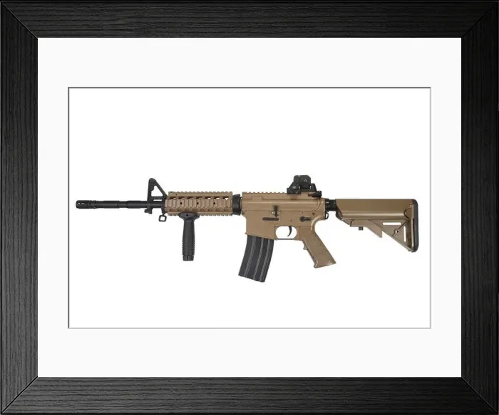Framed Print : M4 special forces assault rifle in tan color isolated on a white background Framed Print : M4 special forces assault rifle in tan color isolated on a white background