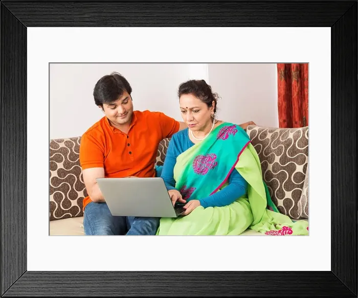 Framed Print : 2 Indian Adult Son And Senior Mother Using Laptop At Home