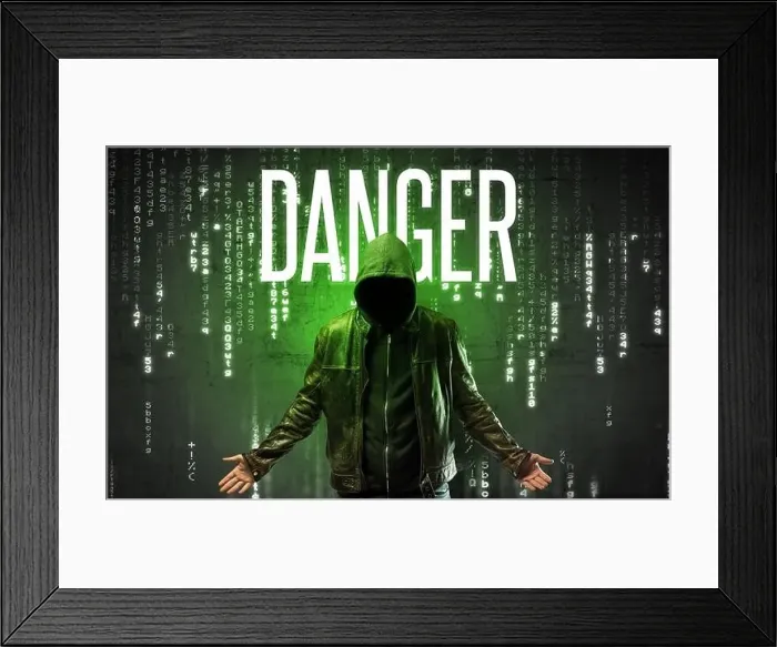 Framed Print : Faceless hacker with DANGER inscription, hacking concept Framed Print : Faceless hacker with DANGER inscription, hacking concept