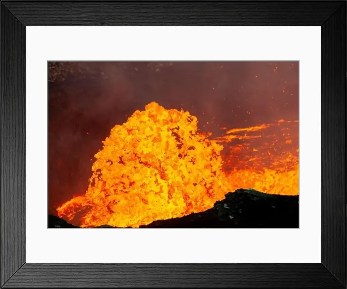 Framed Print : A burst of lava shoots out of the lava lake inside the Marum vent during an expedition to the volcano on Ambrym island Framed Print : A burst of lava shoots out of the lava lake inside the Marum vent during an expedition to the volcano on Ambrym island