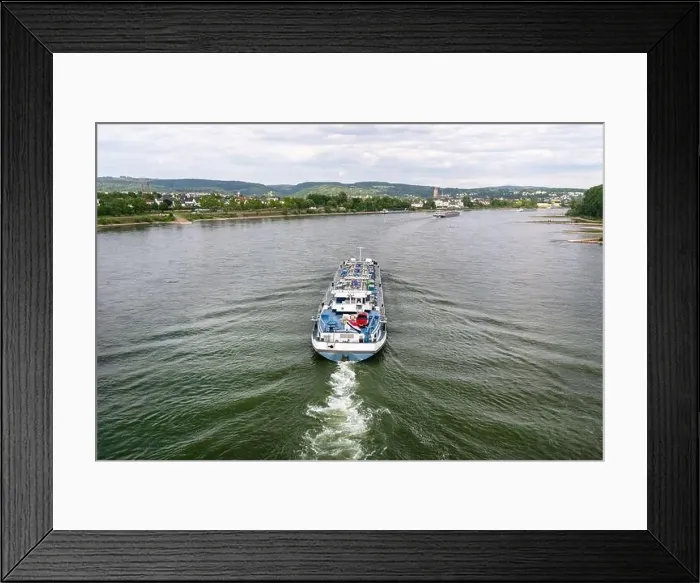 Framed Print : A large tanker ship sailing in Germany on the Rhine River. Transportation of oil, gas and gasoline, view from above Framed Print : A large tanker ship sailing in Germany on the Rhine River. Transportation of oil, gas and gasoline, view from above