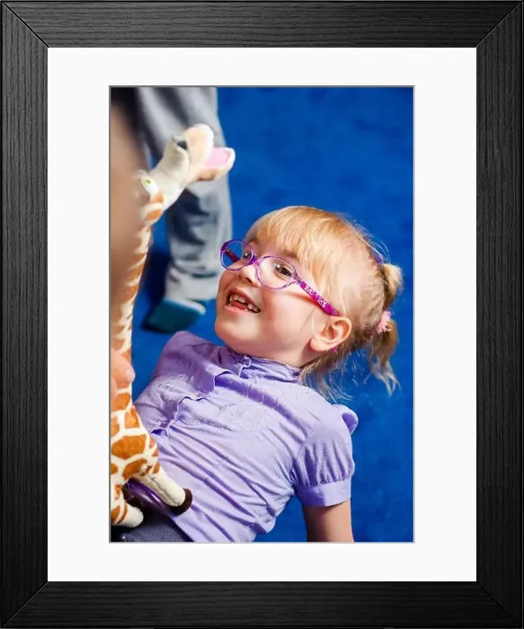 Framed Print : Young girl is ready to start school in a uniform wearing a backpack Framed Print : Young girl is ready to start school in a uniform wearing a backpack