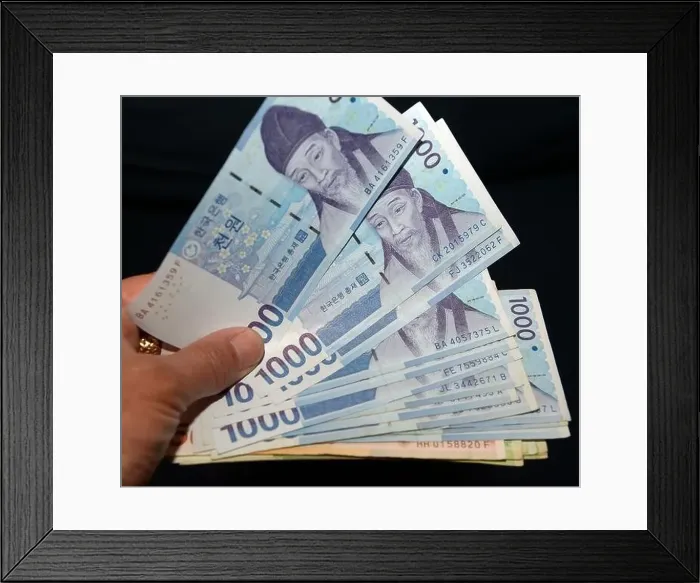 Framed Print : The Korean won. The South Korean won Framed Print : The Korean won. The South Korean won