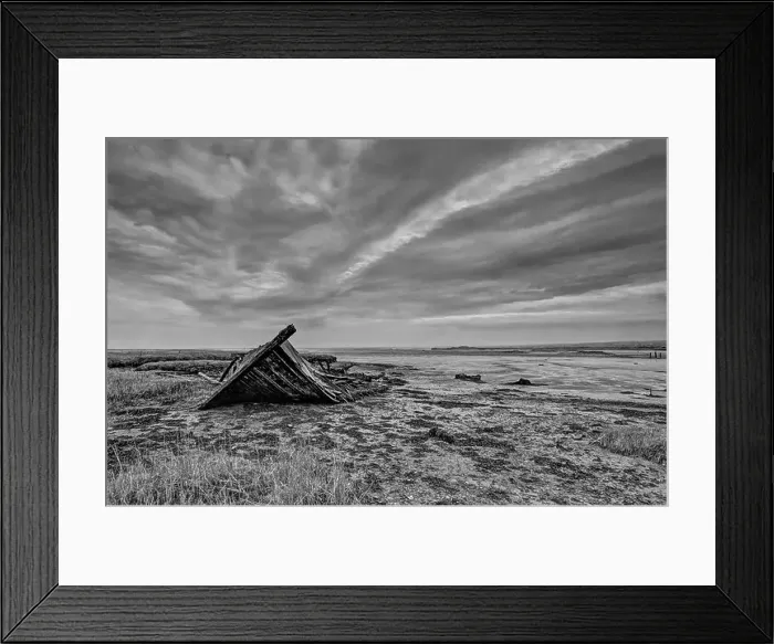 Framed Print : Hoo Peninsula marshes Medway estuary Kent with the remains of a derelict ship Framed Print : Hoo Peninsula marshes Medway estuary Kent with the remains of a derelict ship