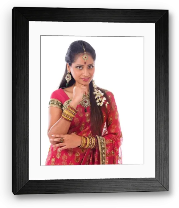 Framed Print : Portrait of beautiful young Indian girl in traditional sari dress thinking Framed Print : Portrait of beautiful young Indian girl in traditional sari dress thinking
