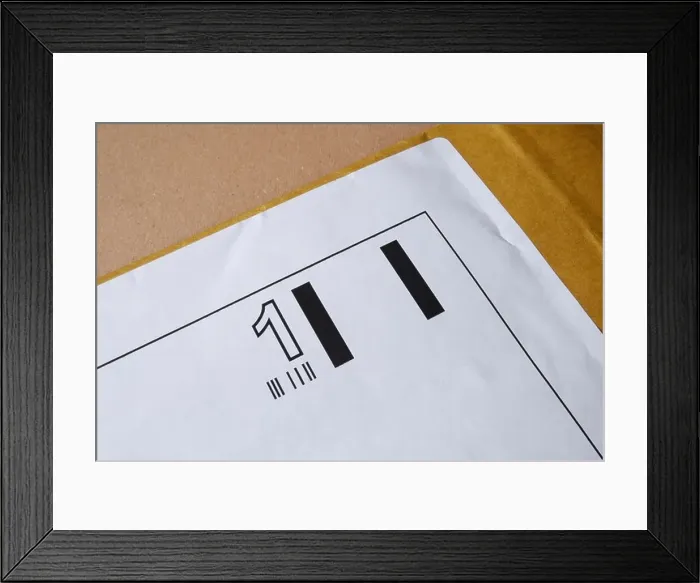 Framed Print : First Class pre paid business reply stamp on padded envelope Framed Print : First Class pre paid business reply stamp on padded envelope