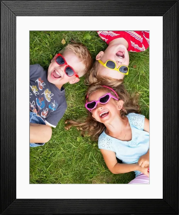 Framed Print : Laughing children relaxing during summer day Framed Print : Laughing children relaxing during summer day