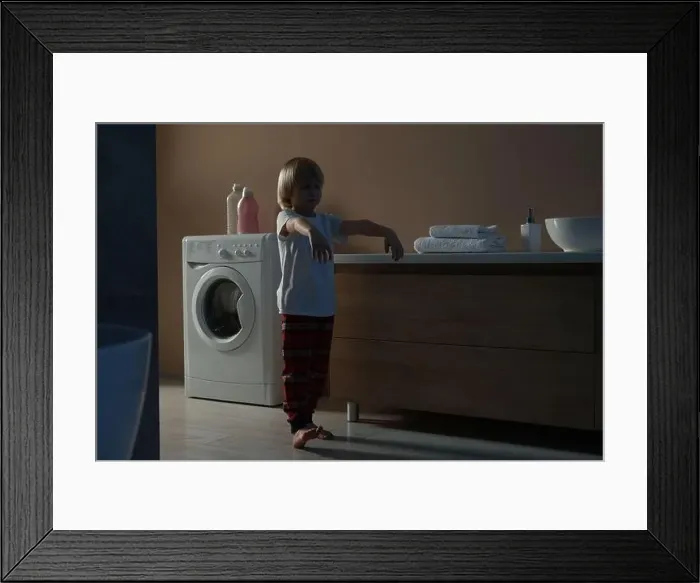 Framed Print : Boy in pajamas sleepwalking indoors at night Framed Print : Boy in pajamas sleepwalking indoors at night