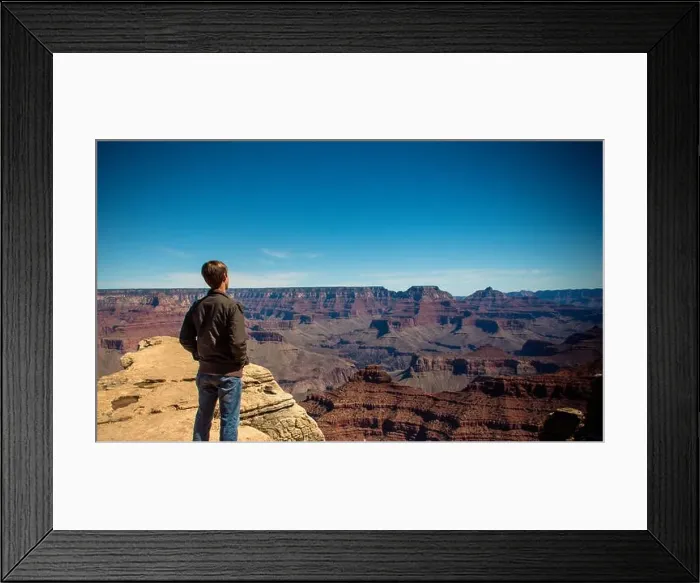 Framed Print : Rear view of a young man looking at view, grand canyon, arizona, america, USA Framed Print : Rear view of a young man looking at view, grand canyon, arizona, america, USA
