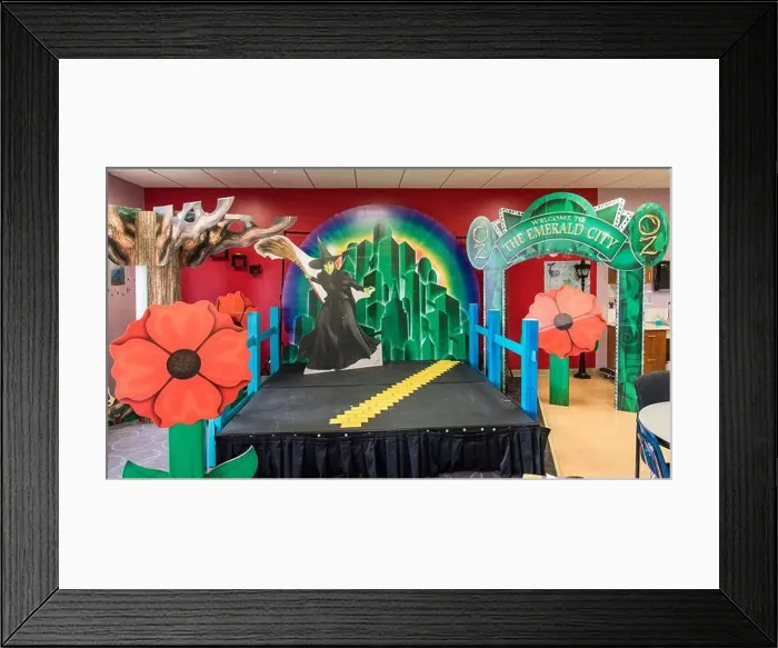 Framed Print : Backgrounds and props that will be used in the “The Wizard of Oz” play are kept and worked on in the Drama room