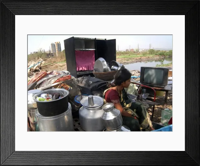 Framed Print : Homeless, slum woman with utensils after house demolished Framed Print : Homeless, slum woman with utensils after house demolished