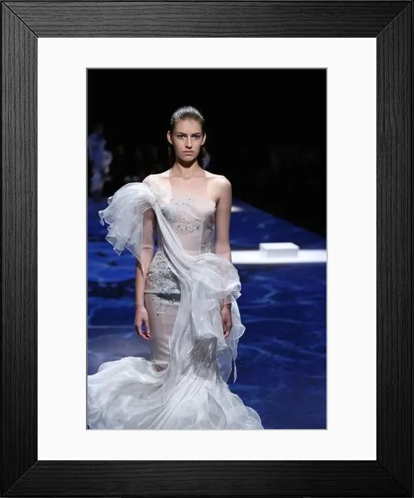 Framed Print : A model displays a new creation by Lan Yu at its Fall / Winter 2014 Haute Couture fashion show in Paris Framed Print : A model displays a new creation by Lan Yu at its Fall / Winter 2014 Haute Couture fashion show in Paris