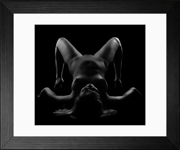 Framed Print : Contour-light picture of nude girl on black background Framed Print : Contour-light picture of nude girl on black background