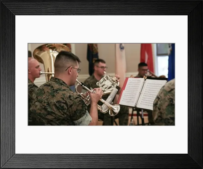 Framed Print : U.S. Marines with the 2d Marine Aircraft Wing Band play the Marine Corps Hymn at a relief Framed Print : U.S. Marines with the 2d Marine Aircraft Wing Band play the Marine Corps Hymn at a relief