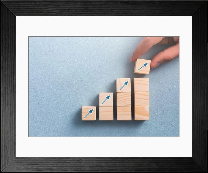Framed Print : Hand arranging wood block with arrow up icon. Business concept growth success process Framed Print : Hand arranging wood block with arrow up icon. Business concept growth success process