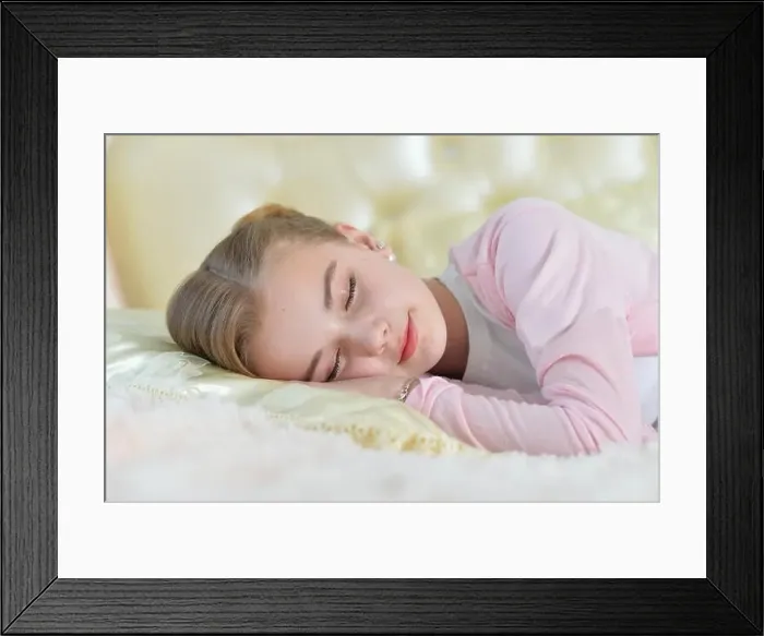 Framed Print : Close-up portrait of cute little girl sleeping Framed Print : Close-up portrait of cute little girl sleeping