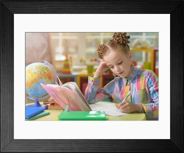 Framed Print : cute little girl doing lessons Framed Print : cute little girl doing lessons