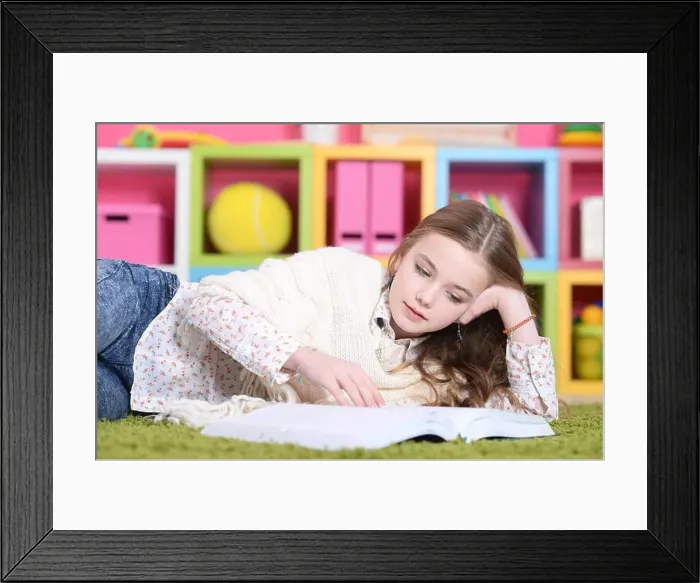 Framed Print : Portrait of beautiful cute happy girl studying at home Framed Print : Portrait of beautiful cute happy girl studying at home