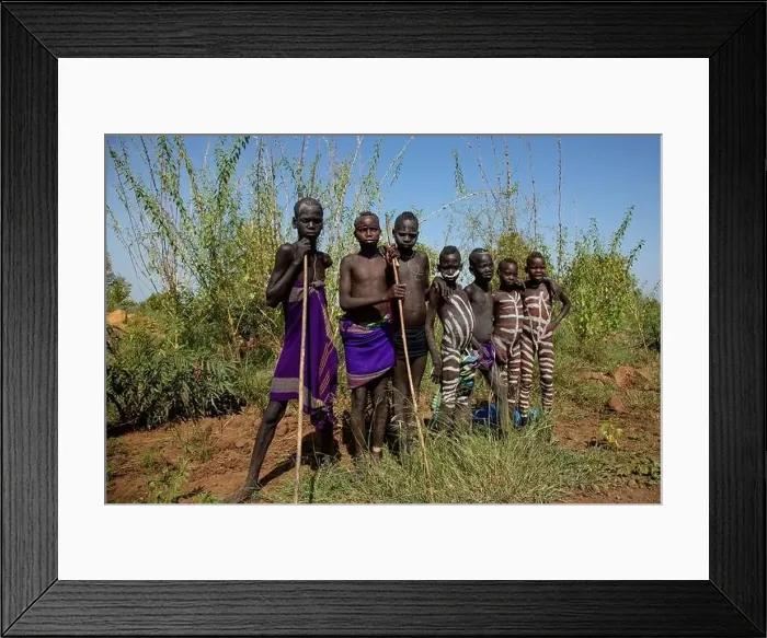 Framed Print : painted Mursi boys in Mago National Park, Lower Omo Valley of Ethiopia Framed Print : painted Mursi boys in Mago National Park, Lower Omo Valley of Ethiopia