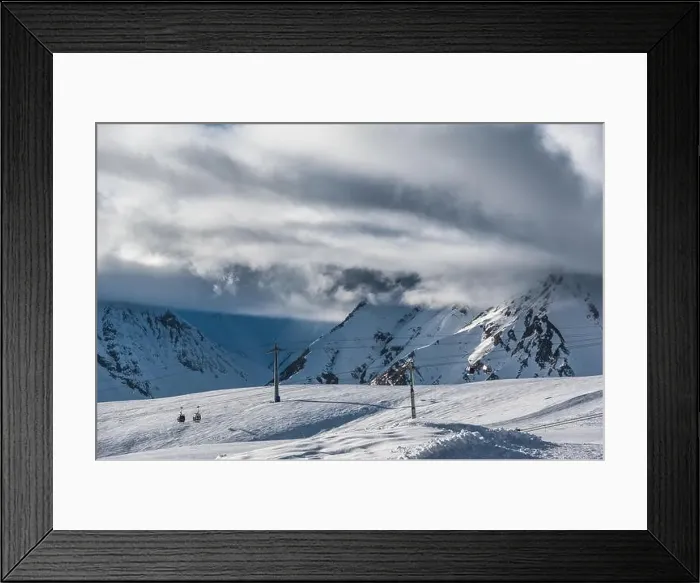 Framed Print : Snowy winter mountains in sun day. Georgia, from ski resort Gudauri Framed Print : Snowy winter mountains in sun day. Georgia, from ski resort Gudauri