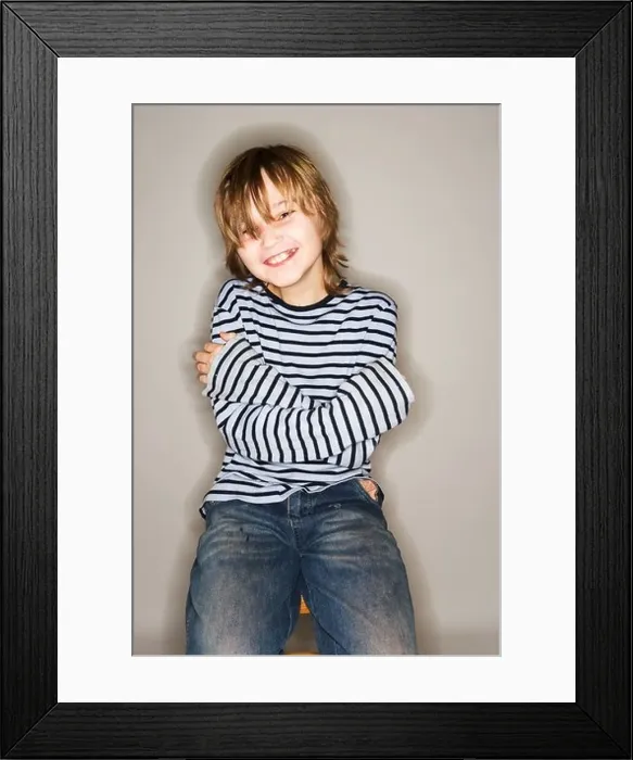 Framed Print : PORTRAIT OF 11 YEAR OLD BOY SITTING ON STOOL SMILING HAPPY ARMS CROSSED Framed Print : PORTRAIT OF 11 YEAR OLD BOY SITTING ON STOOL SMILING HAPPY ARMS CROSSED