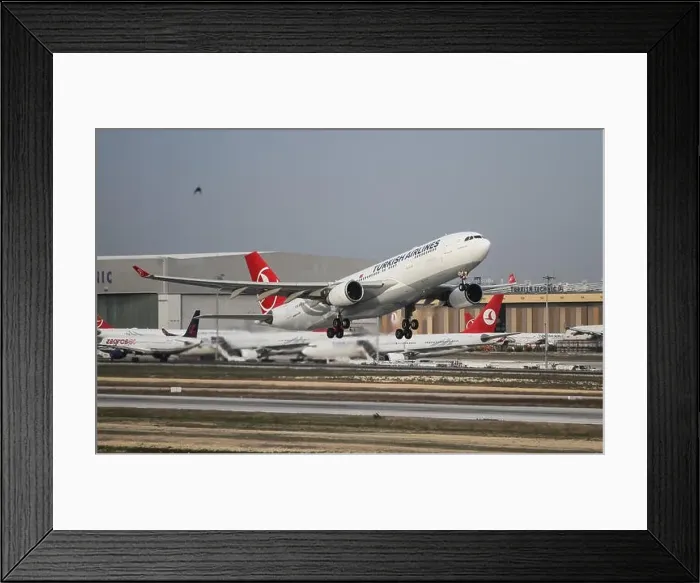 Framed Print : Turkish Airlines Airbus A330-202 (CN 882) takes off from Istanbul Ataturk Airport