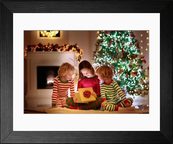 Framed Print : Children at Christmas tree and fireplace on Xmas eve Framed Print : Children at Christmas tree and fireplace on Xmas eve
