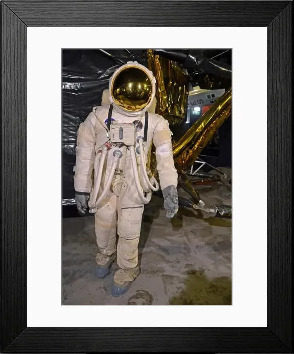 Framed Print : Space suit, astronaut, beside a replica of the US Lunar Lander Space Craft at The Science Museum, London, UK Framed Print : Space suit, astronaut, beside a replica of the US Lunar Lander Space Craft at The Science Museum, London, UK