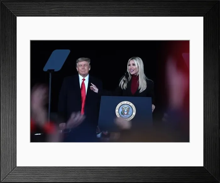 Framed Print : U.S. President Donald Trump looks on as his daughter Framed Print : U.S. President Donald Trump looks on as his daughter