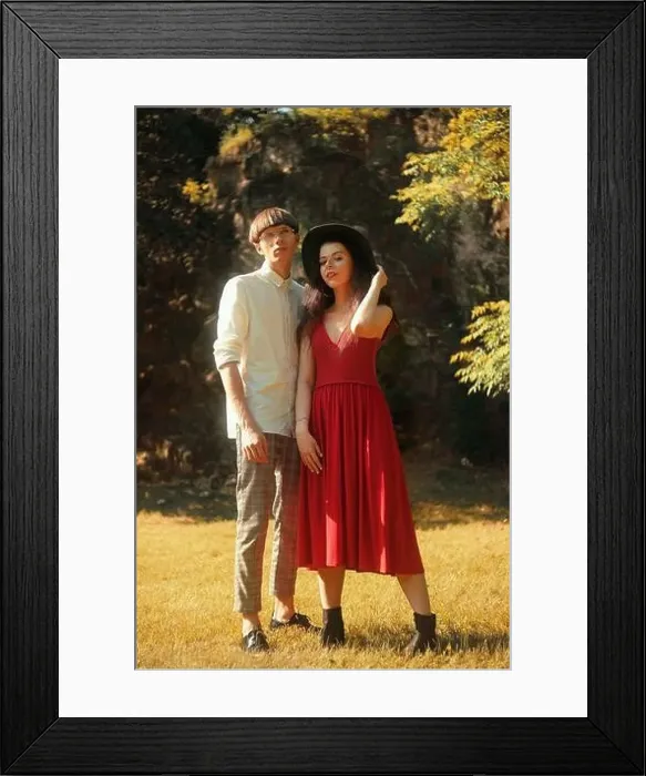Framed Print : Beautiful fashion hipster couple in the forest park Framed Print : Beautiful fashion hipster couple in the forest park
