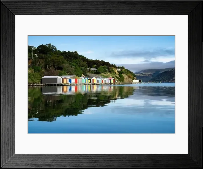 Framed Print : Colorful Boat Sheds with beautiful reflection on daytime at Duvauchelle Framed Print : Colorful Boat Sheds with beautiful reflection on daytime at Duvauchelle