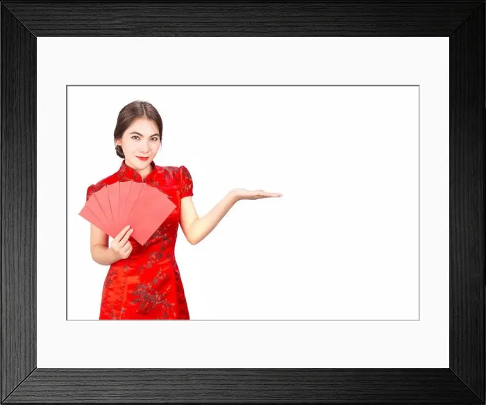Framed Print : Asian girl in traditional and take Red envelopes chinese new year Framed Print : Asian girl in traditional and take Red envelopes chinese new year