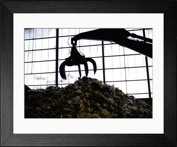 Framed Print : Claw machine picking up trash in warehouse Framed Print : Claw machine picking up trash in warehouse