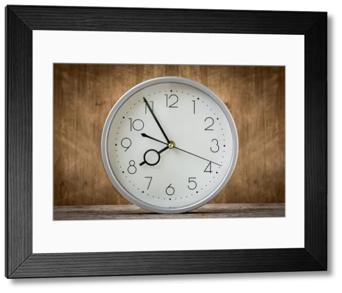 Framed Print : Clock showing 7:55 o'clock in a morning Framed Print : Clock showing 7:55 o'clock in a morning