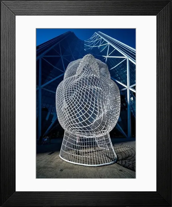 Framed Print : The Wonderland sculpture in front of the Bow Tower, in downtown Calgary, Alberta, Canada Framed Print : The Wonderland sculpture in front of the Bow Tower, in downtown Calgary, Alberta, Canada