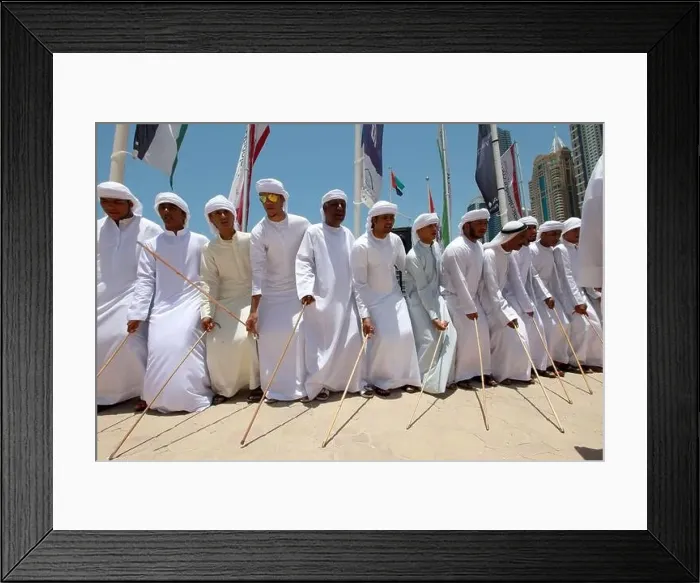 Framed Print : Emirati men celebrate with traditional song and dance. Dubai, UAE Framed Print : Emirati men celebrate with traditional song and dance. Dubai, UAE
