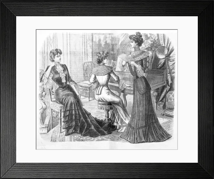 Framed Print : Women in music room playing piano wearing vintage festive clothing Framed Print : Women in music room playing piano wearing vintage festive clothing