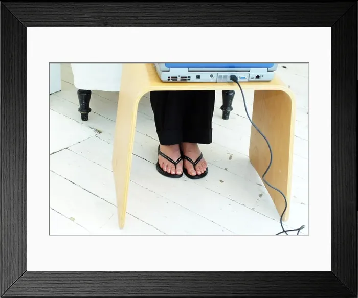 Framed Print : Womans feet and laptop Framed Print : Womans feet and laptop