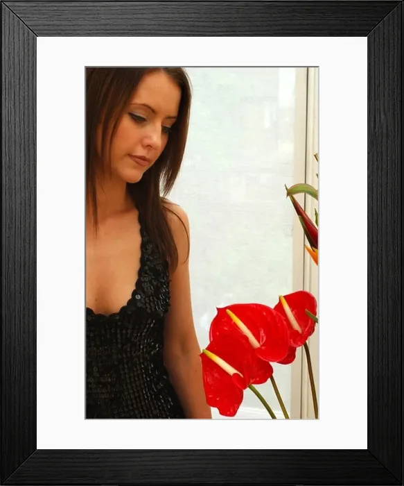 Framed Print : Woman in Evening wear with red flowers