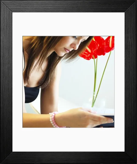 Framed Print : Young Woman Reading a book Framed Print : Young Woman Reading a book