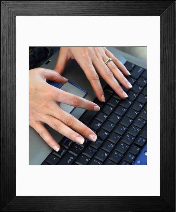 Framed Print : Womans hands typing on a laptop keyboard Framed Print : Womans hands typing on a laptop keyboard