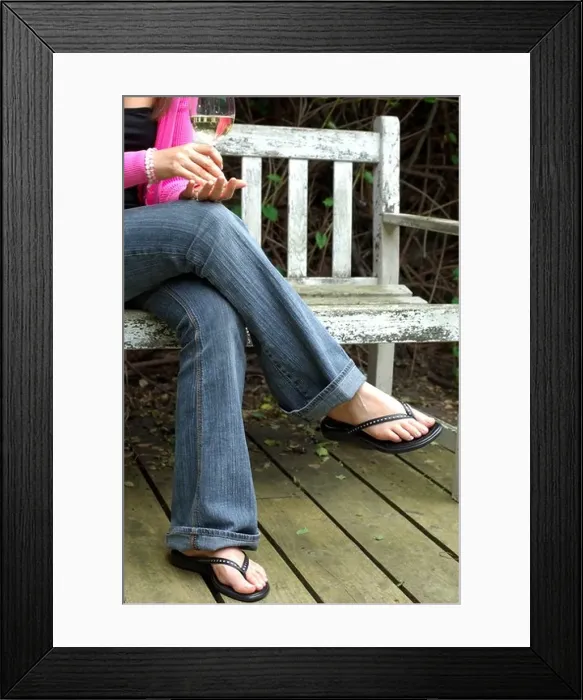 Framed Print : Young Woman in Garden drinking wine Framed Print : Young Woman in Garden drinking wine