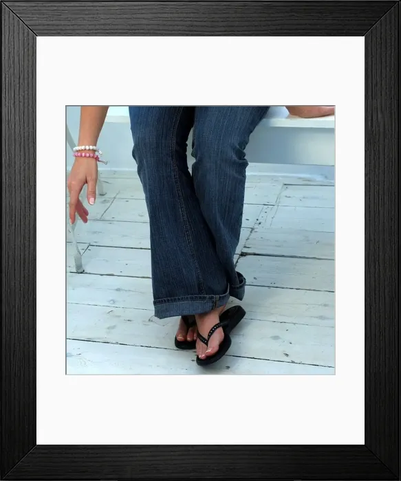 Framed Print : Young womans legs and feet Framed Print : Young womans legs and feet