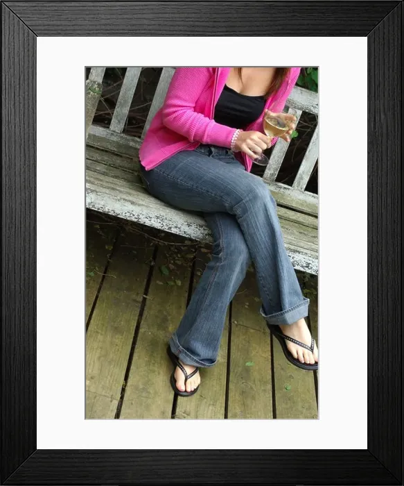 Framed Print : Young Woman in Garden drinking wine Framed Print : Young Woman in Garden drinking wine