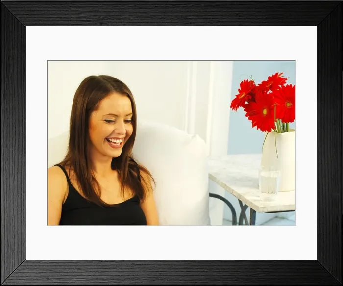 Framed Print : Young woman smiling Framed Print : Young woman smiling