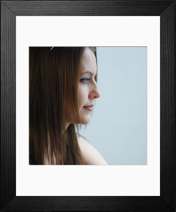 Framed Print : Young pensive woman close up Framed Print : Young pensive woman close up
